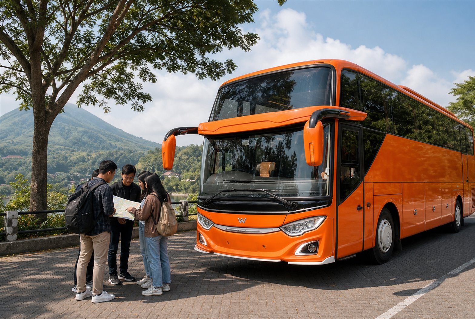 Bus Sewa Bus Malang melintasi jalan raya antar sawah di Jawa Timur