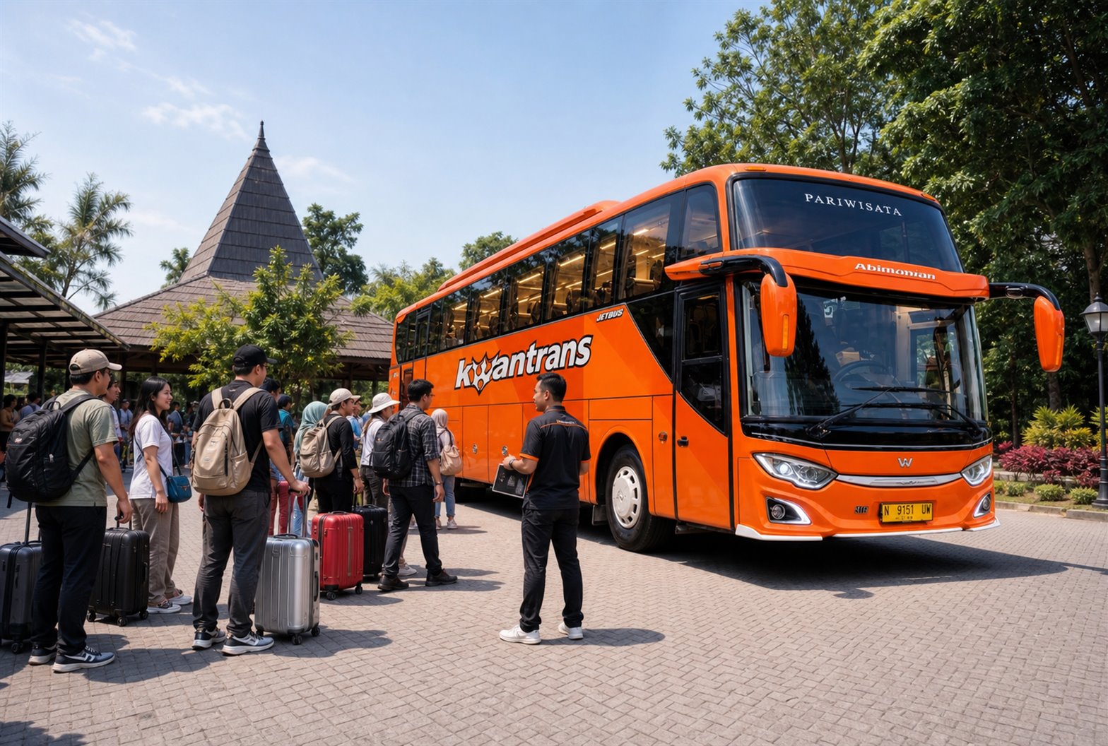Rombongan naik bus pariwisata